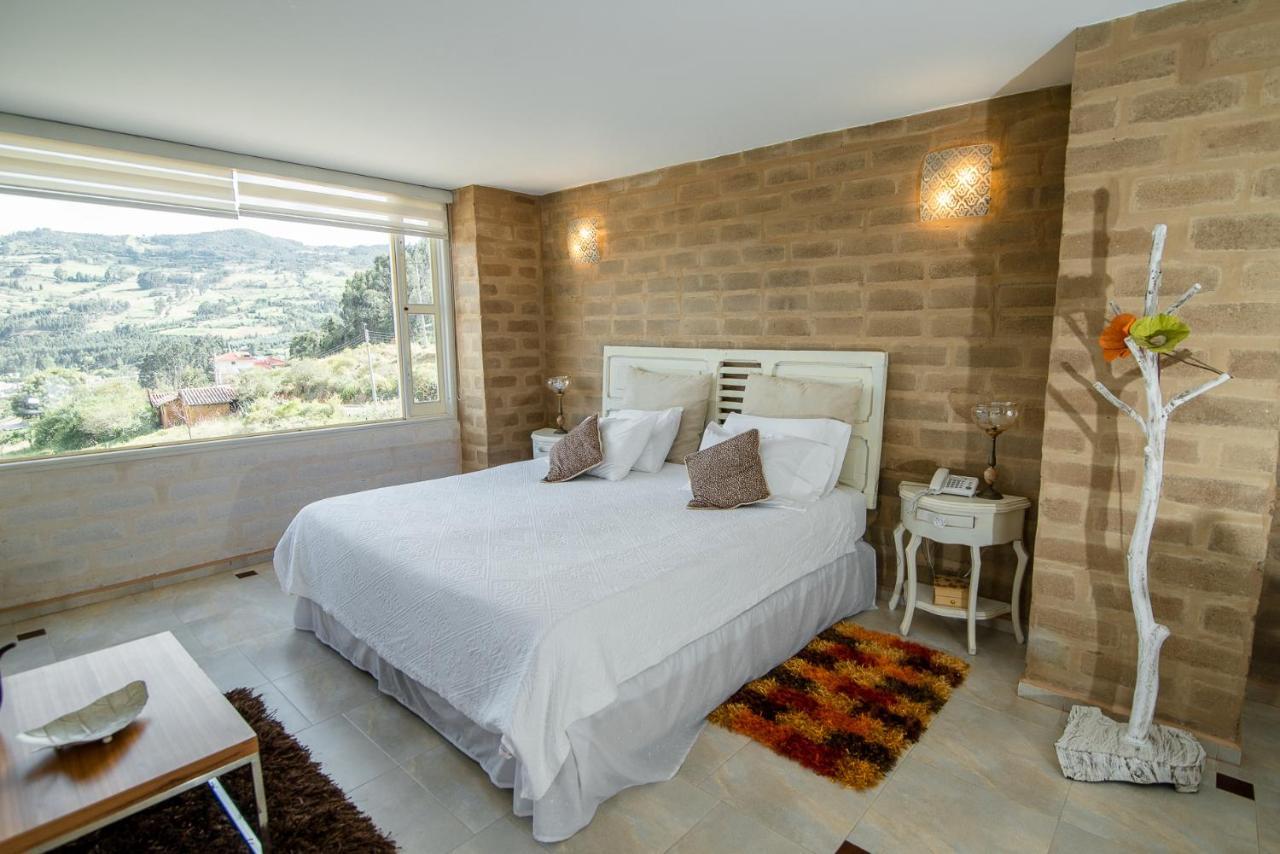 Bella Tierra Hotel Boutique ティバソサ エクステリア 写真
